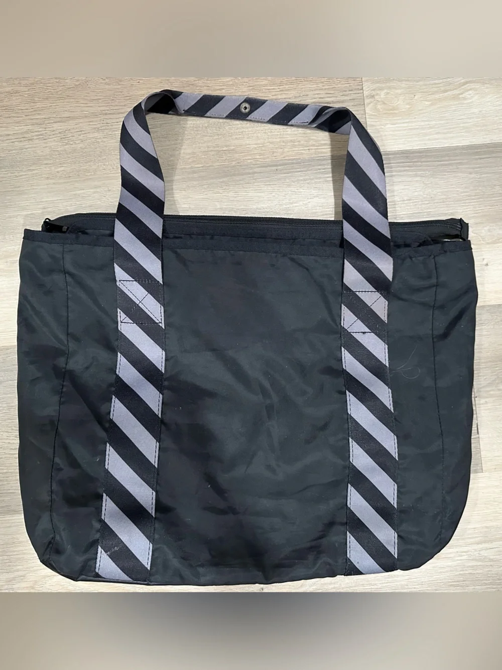 Nike Black Duffel Tote with Gray Diagonal-Striped Handles